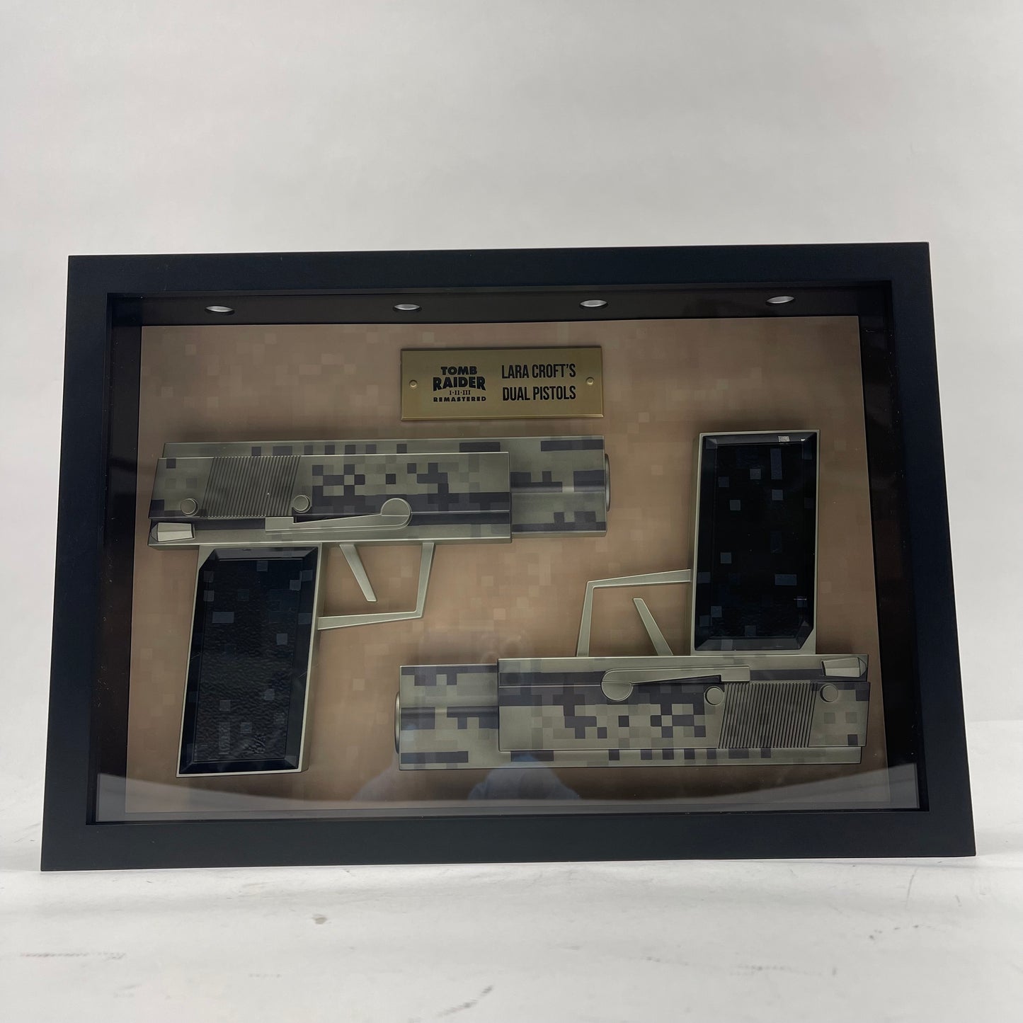 New Limited Run Games Tomb Raider I-III Remastered Pistol Replicas Shadowbox